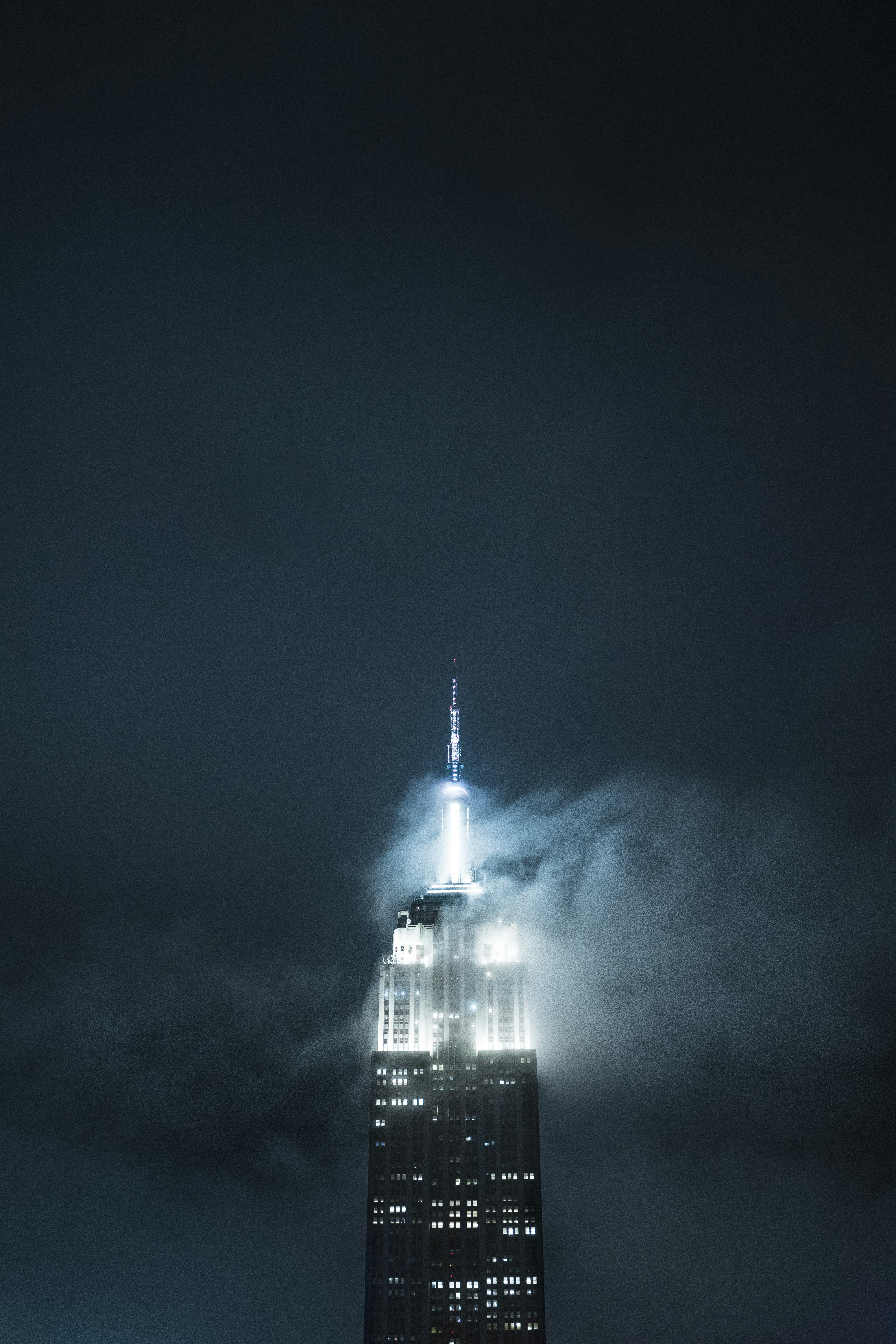 This Picture What Was Made From The 230 Fifth Rooftop Bar In NYC. From There You Have An Amazing View Directly To The Empire State Building. While Making This Photo The Weather Switched Rapidly And The Clouds And Fog Curled Around The Building.