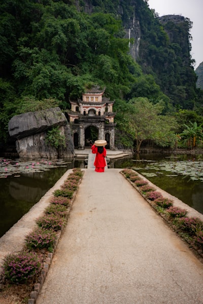 Woman In Front Of Temple In Ninh Binh wallpaper preview