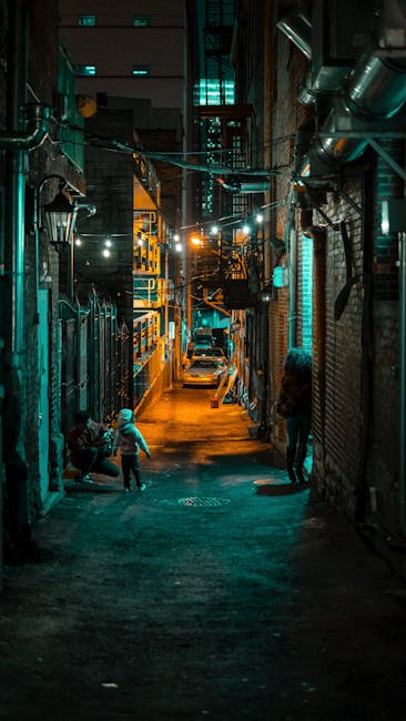 Colorful And Moody Alleyway Scene In Nashville, TN With People Enjoying A Vibrant Night. wallpaper preview