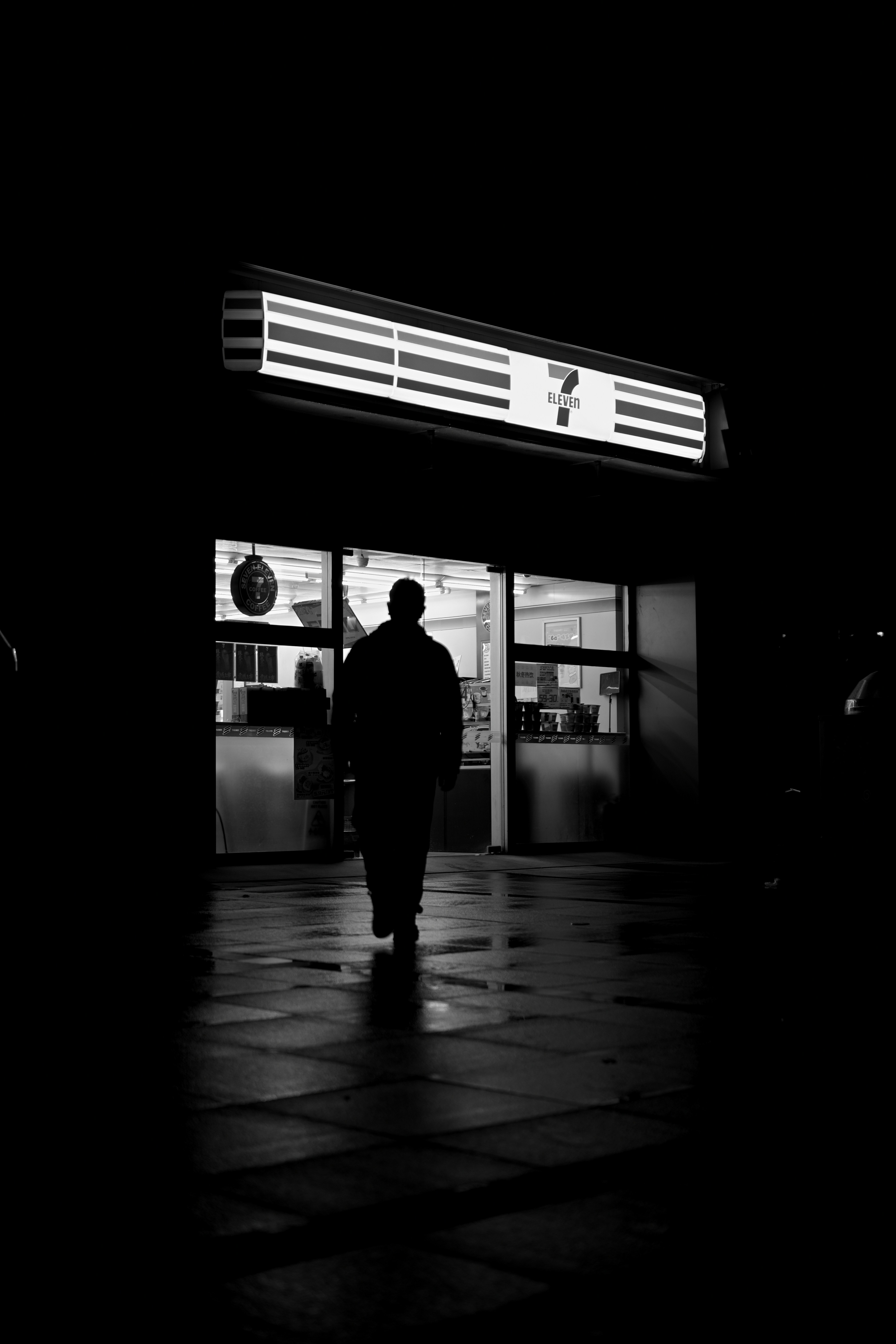 Man Walking Towards A Brightly Lit Convenience Store At Night HD mobile wallpaper