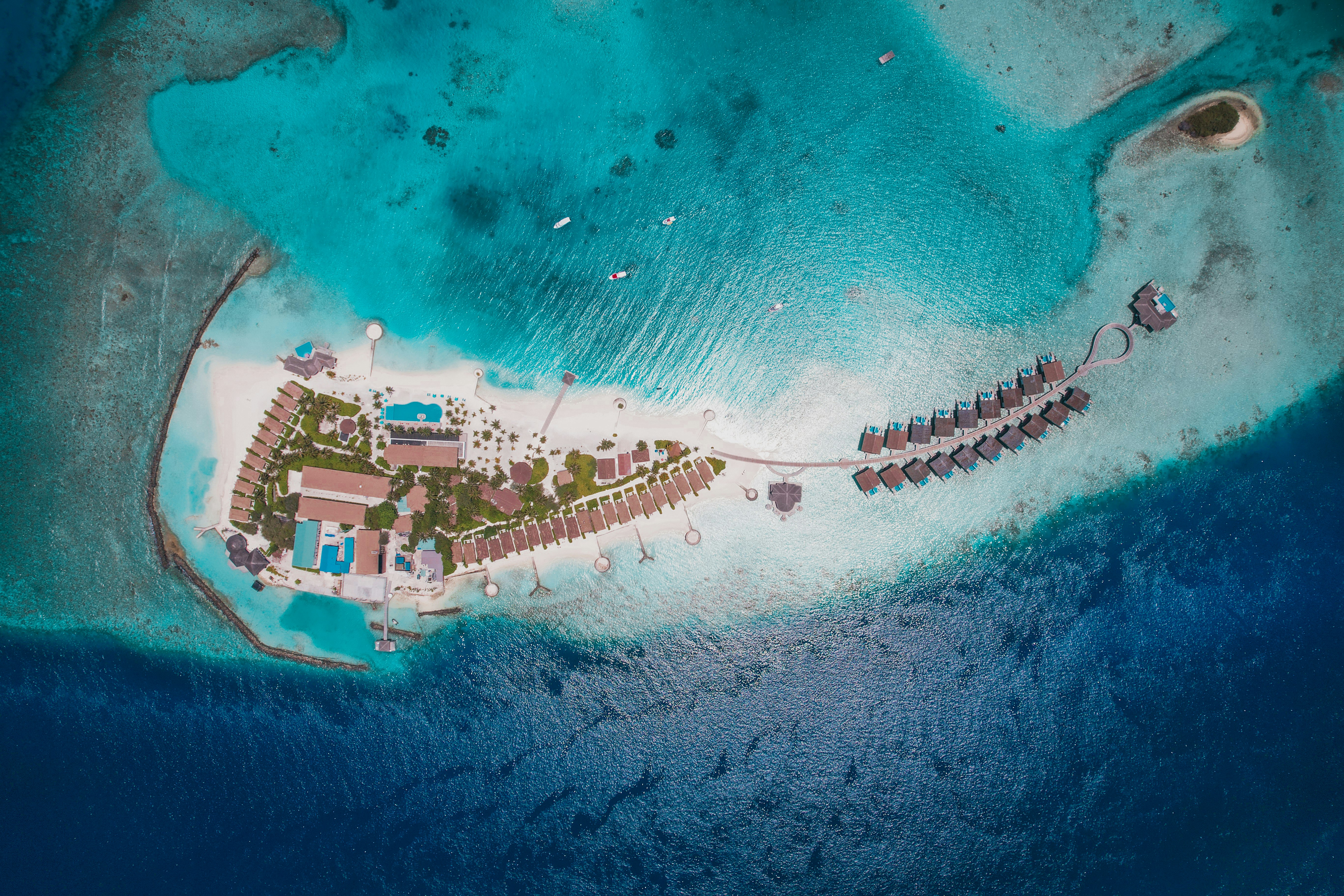 Aerial View Of A Tropical Island Resort And Turquoise Ocean. HD mobile wallpaper