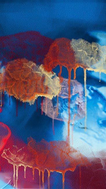 Vivid Abstract Painting With Drips Of Orange, Blue, And Red On Textured Canvas. wallpaper preview