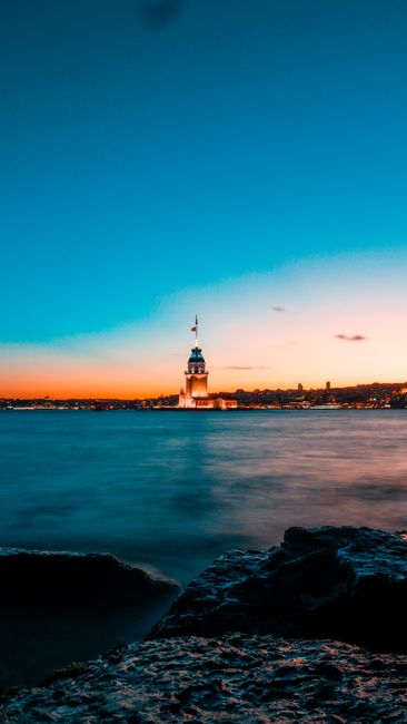 Stunning View Of Maiden's Tower During Sunset Over The Bosphorus In Istanbul, Turkey.