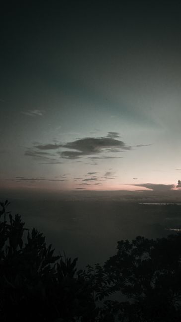 Silhouette Of Trees Growing On Mountain Slope In Peaceful Valley Against Cloudy Sundown Sky wallpaper preview