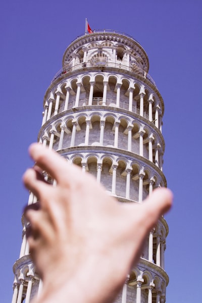 Leaning Tower Of Pisa With Outstretched Hand wallpaper preview