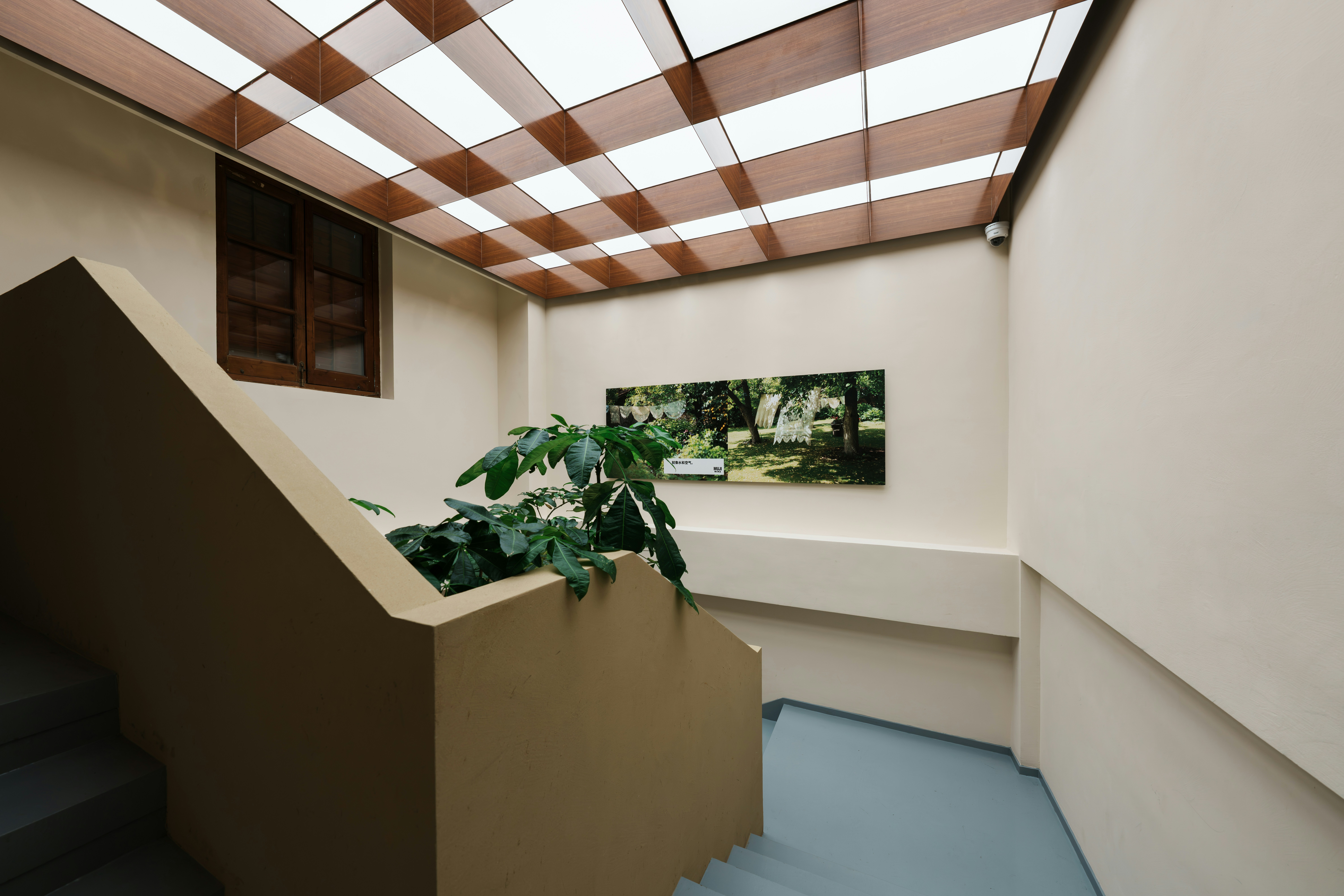 Modern Staircase With Checkered Ceiling And Wall Art HD mobile wallpaper