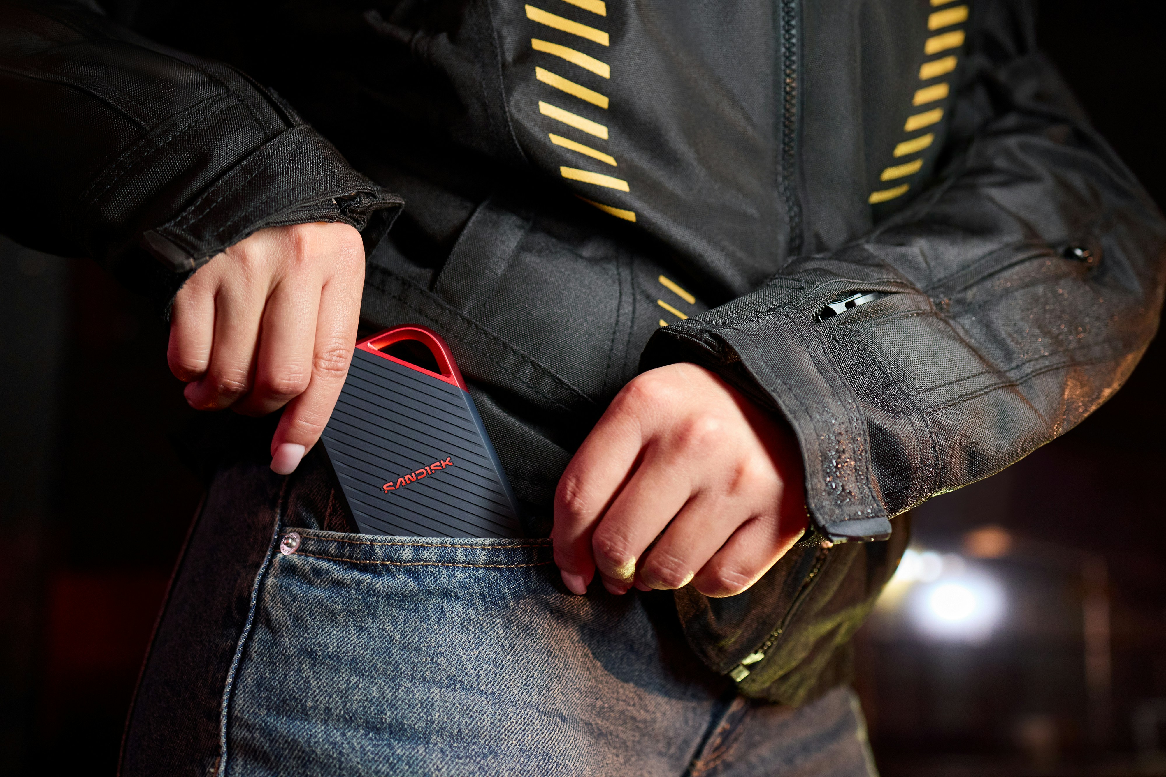 A Person Puts A Portable Speaker Into A Jeans Pocket. HD mobile wallpaper