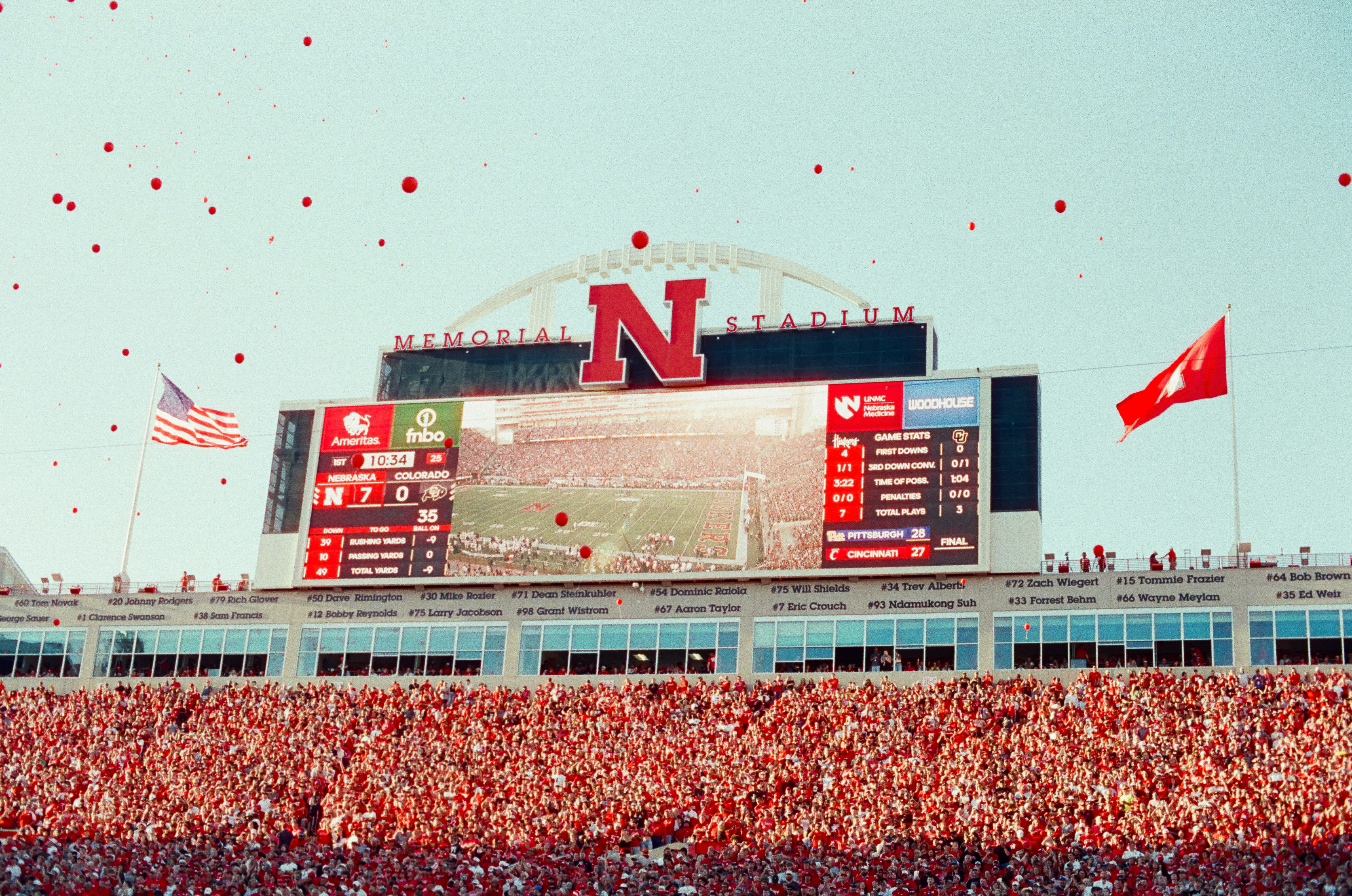 Fans Celebrate At A Football Stadium With Scoreboards. HD mobile wallpaper