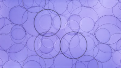 Translucent Circles On A Purple Background. wallpaper preview