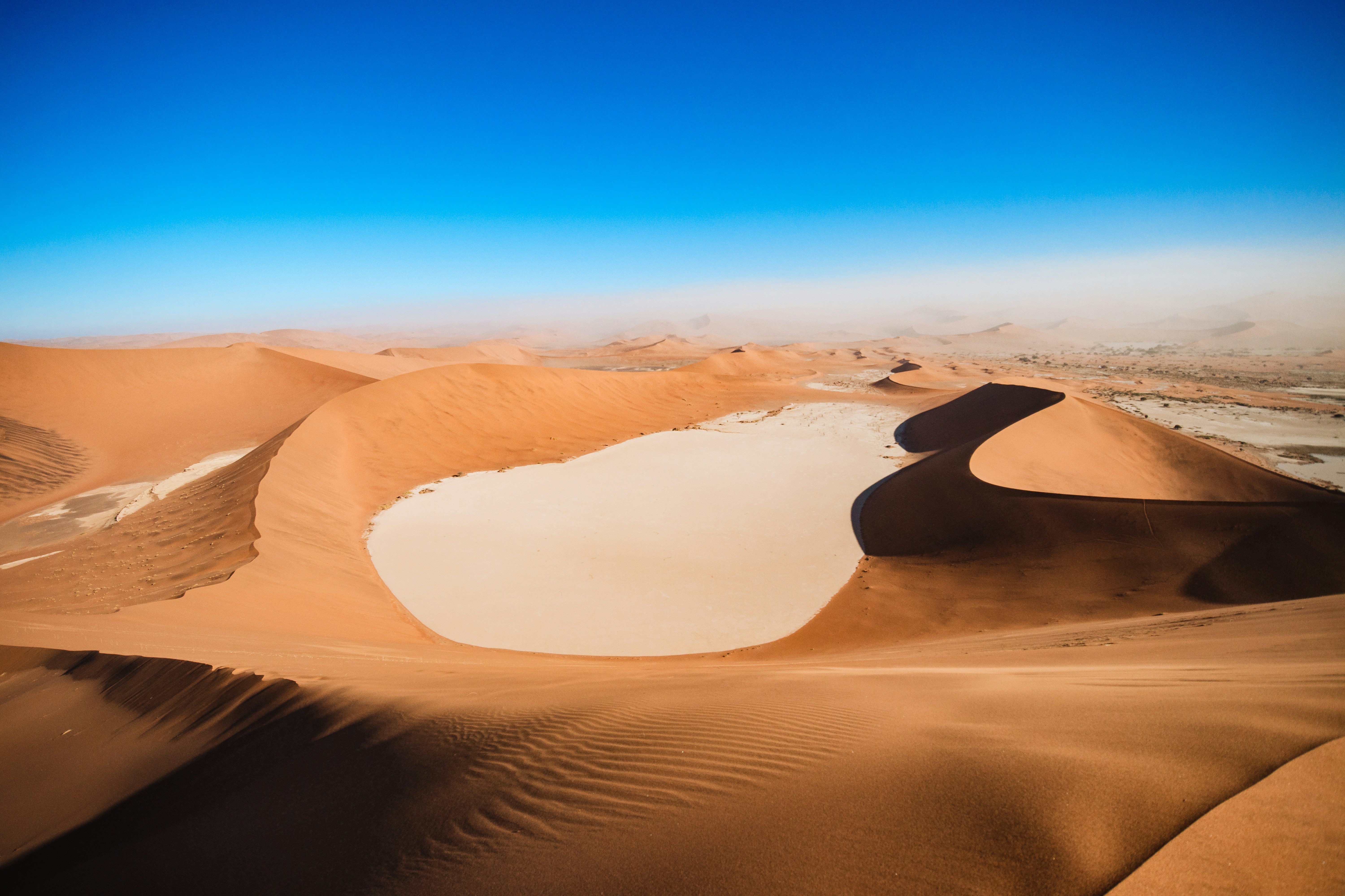 Sweeping Desert Dunes Under A Clear Blue Sky. HD mobile wallpaper