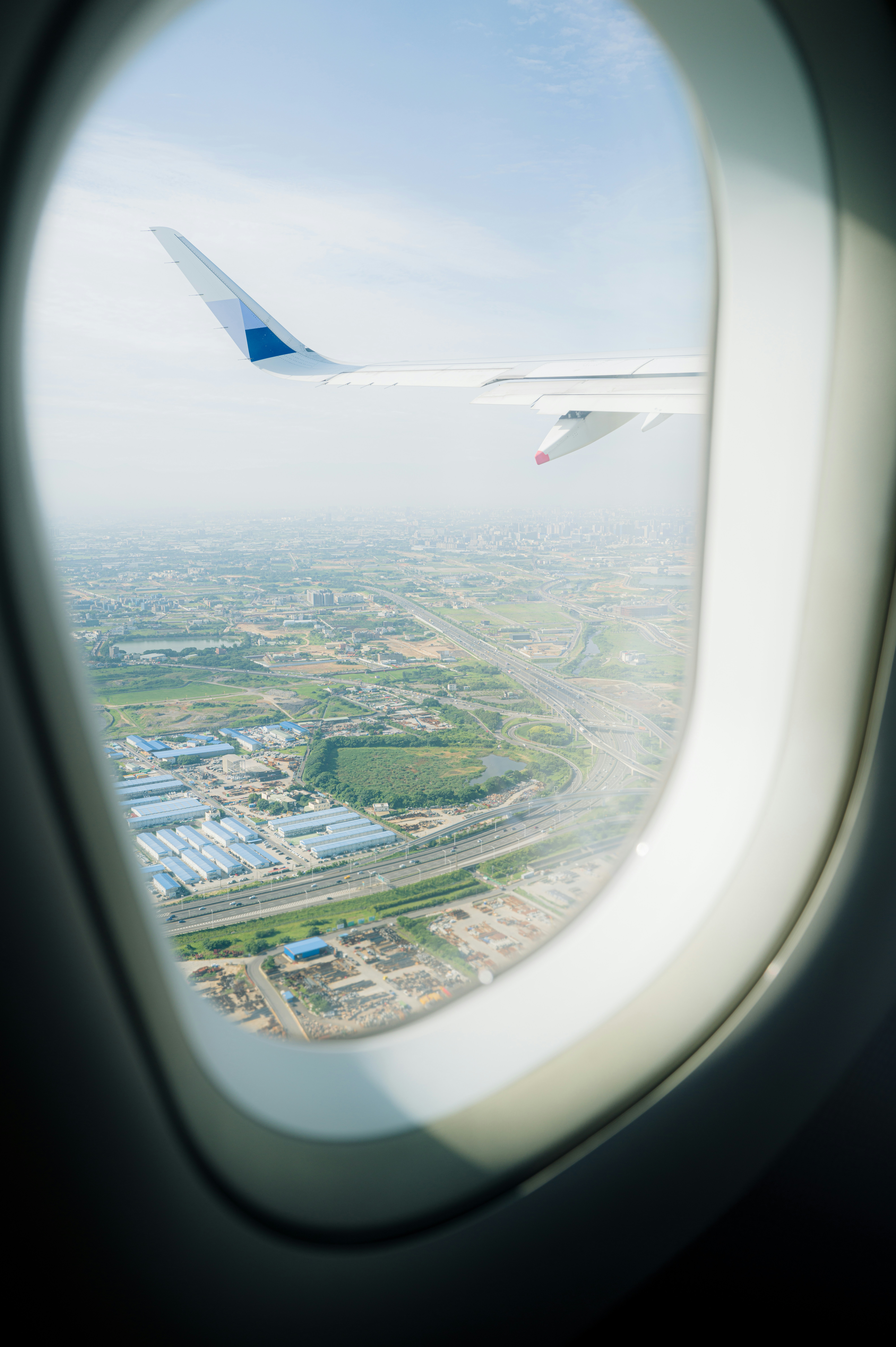 Airplane Wing And City View From A Window. HD mobile wallpaper