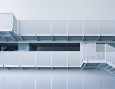Modern White Building With Balconies And Stairs wallpaper preview
