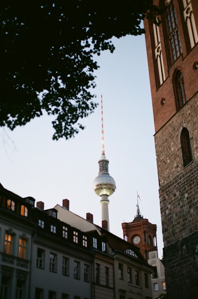Berlin TV Tower Framed By Old Buildings At Dusk. wallpaper preview