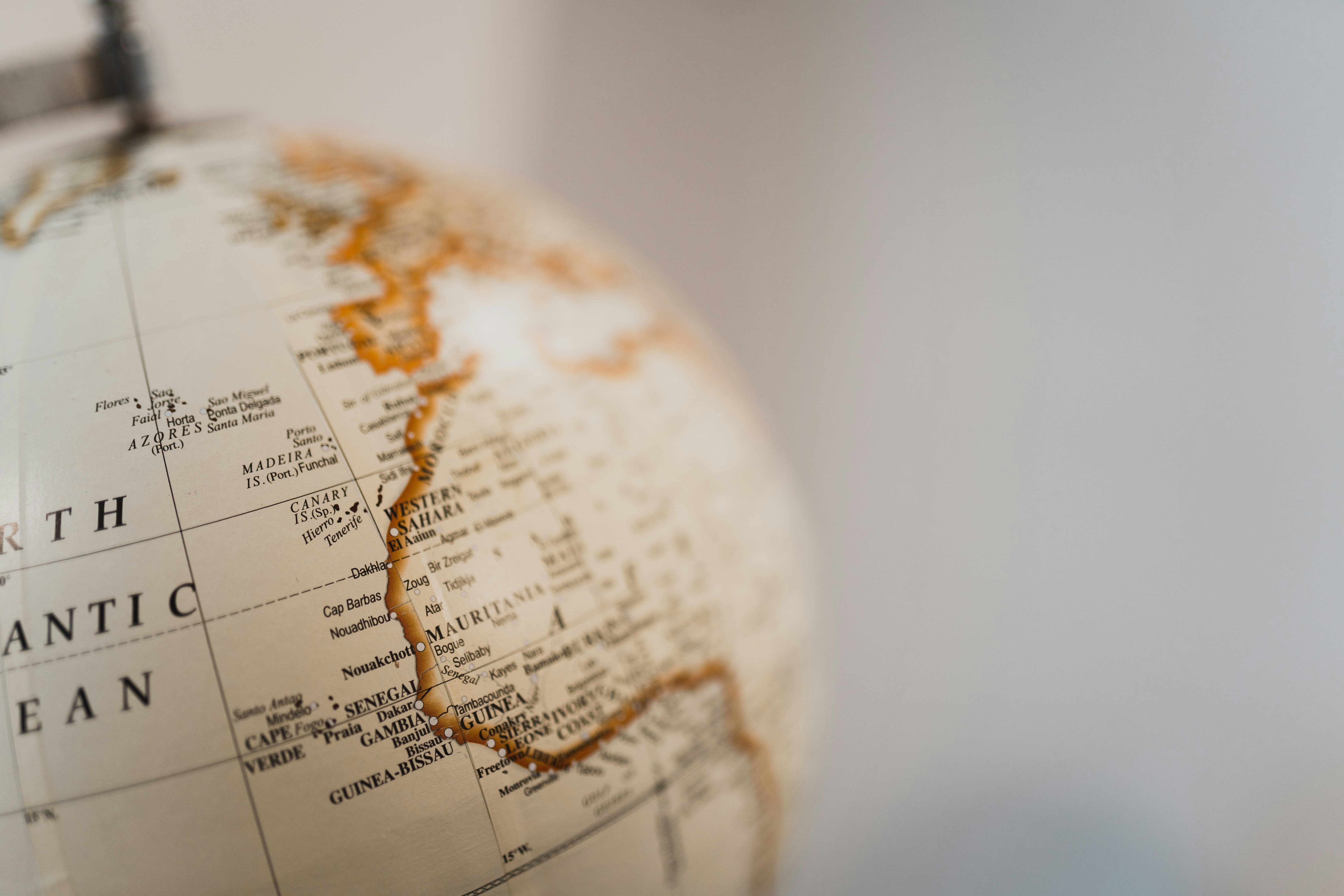 A Vintage Globe Showing The North Atlantic Ocean And Continents. HD mobile wallpaper