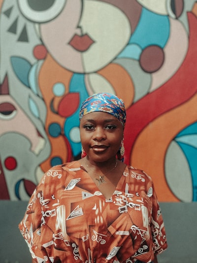 Woman In Colorful Headscarf And Patterned Dress wallpaper preview