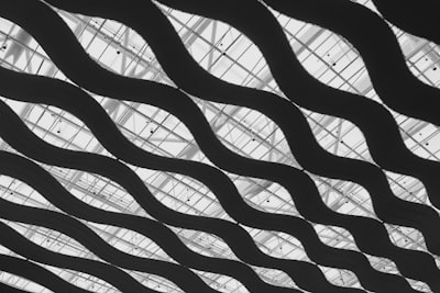 Diagonal Wavy Patterns On A Modern Architectural Ceiling. wallpaper preview
