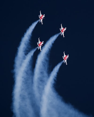 Five Fighter Jets Flying With Smoke Trails In Dark Sky. wallpaper preview