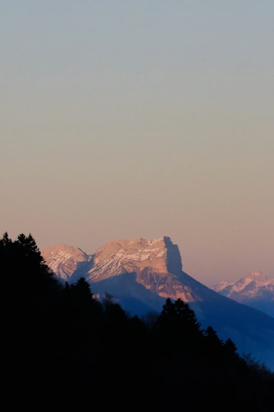 Mountain Peak Illuminated By The Setting Sun wallpaper preview