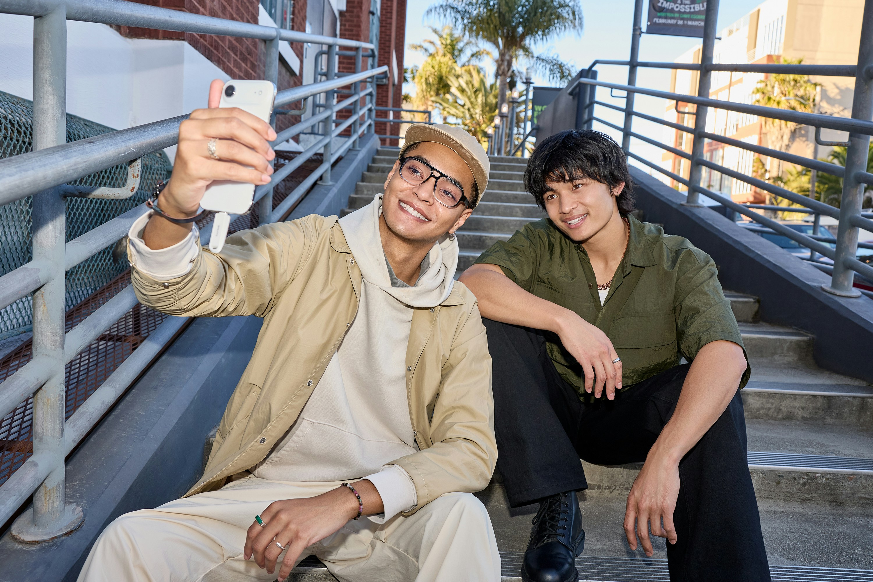 Two Young Men Taking A Selfie On Outdoor Stairs. HD mobile wallpaper