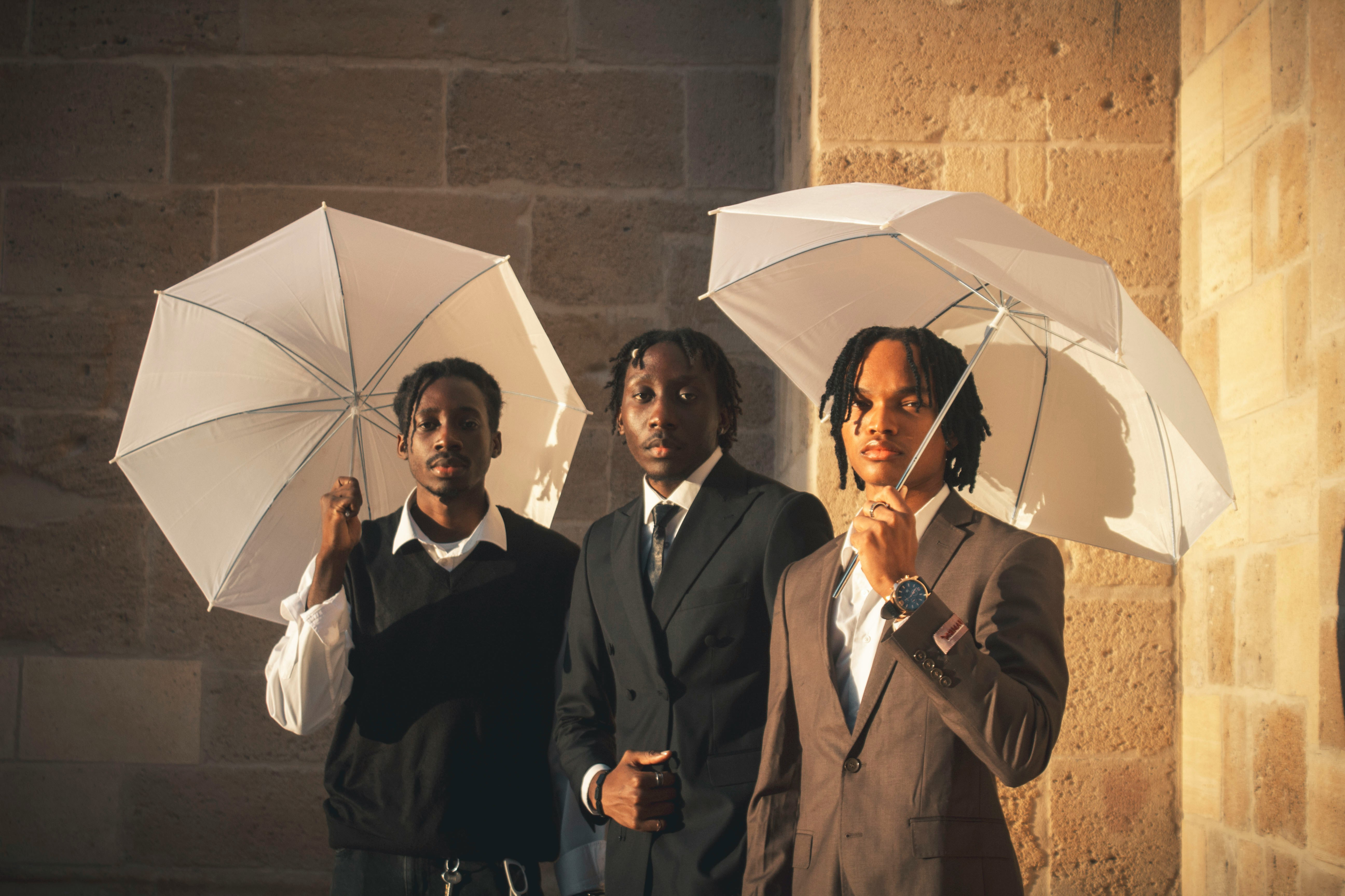 Three Young Men Holding White Umbrellas Outdoors HD mobile wallpaper