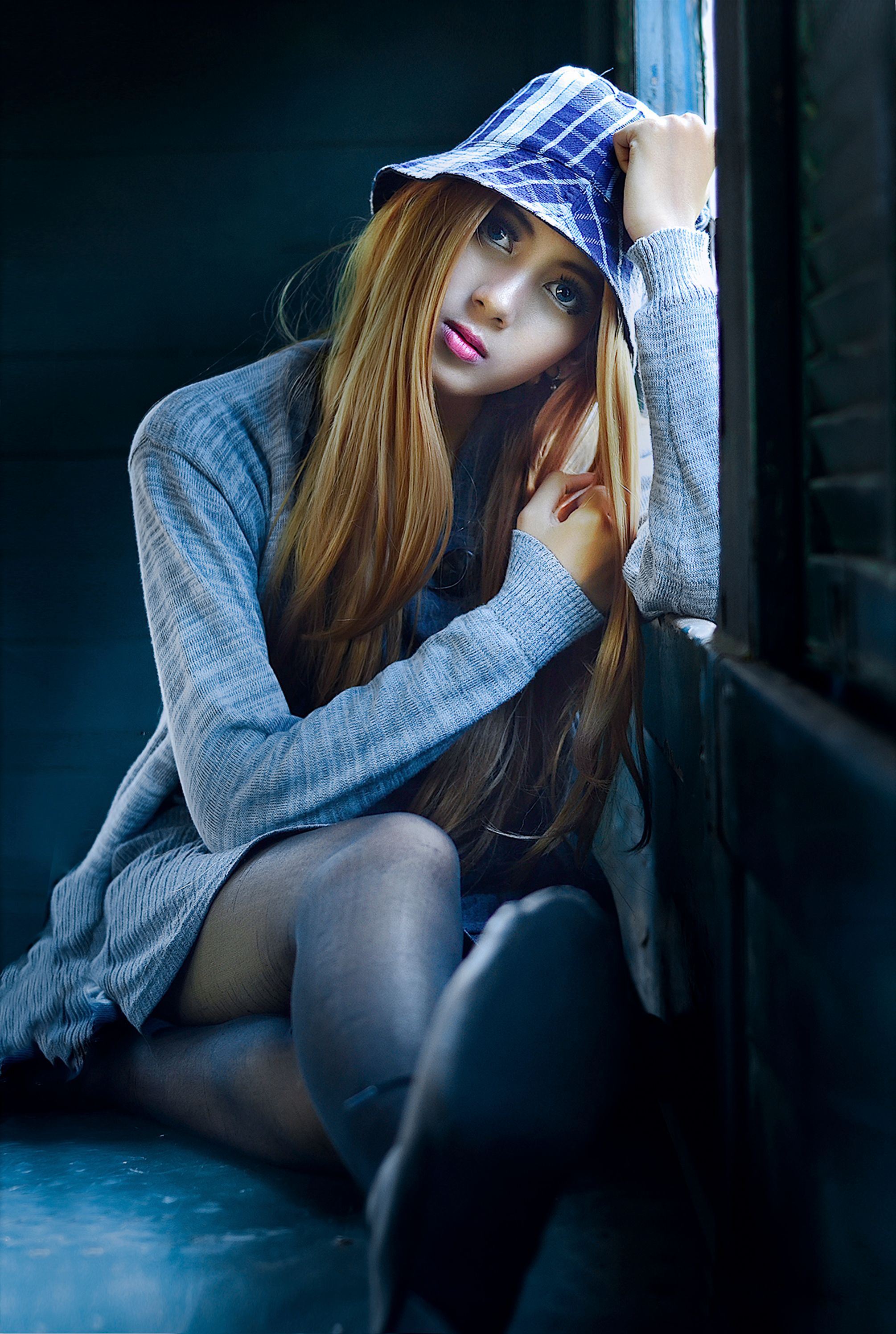 Captivating Portrait Of A Woman With A Blue Hat, Gazing By A Window. HD mobile wallpaper