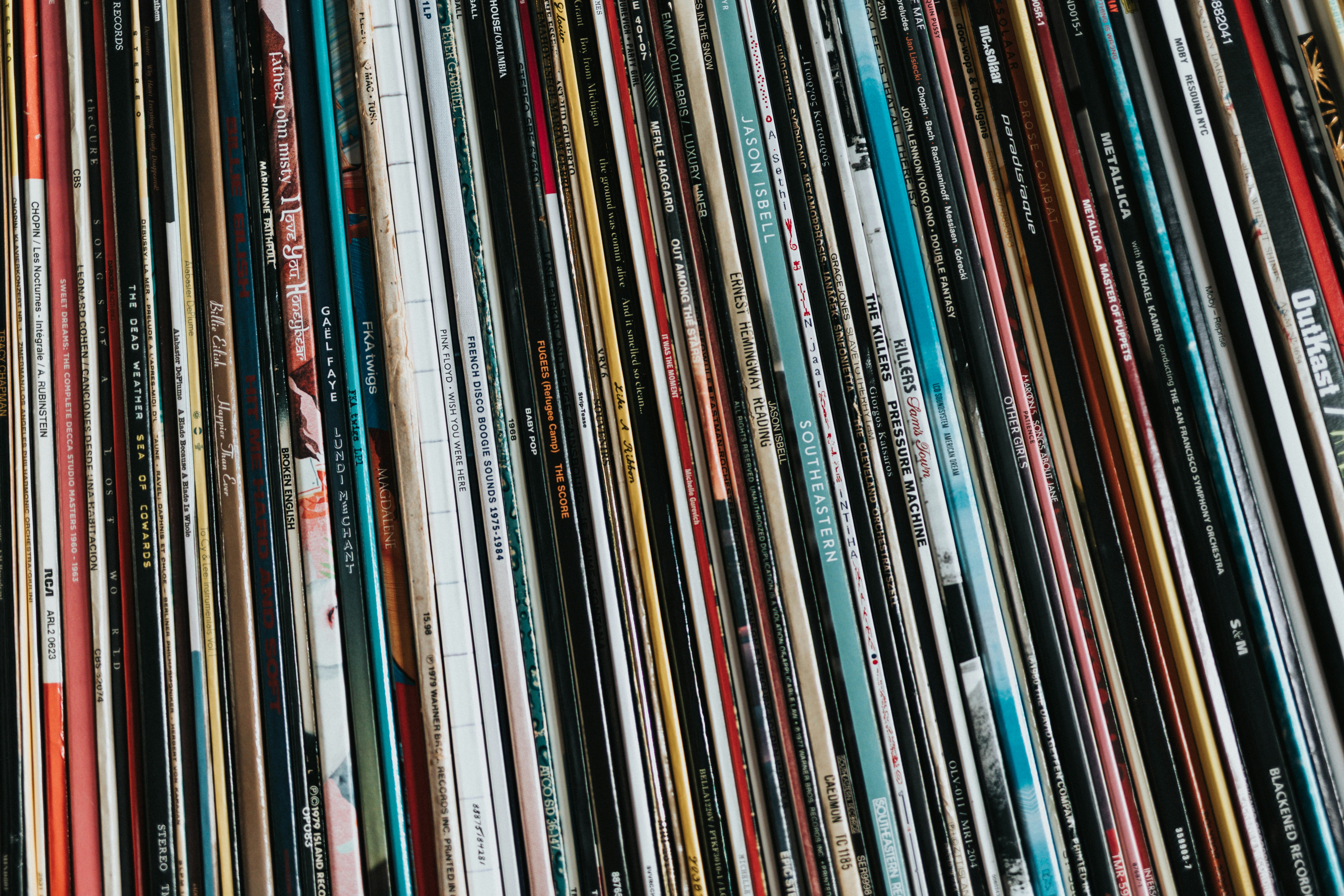 Colorful Vinyl Record Spines Stacked Closely Together. HD mobile wallpaper
