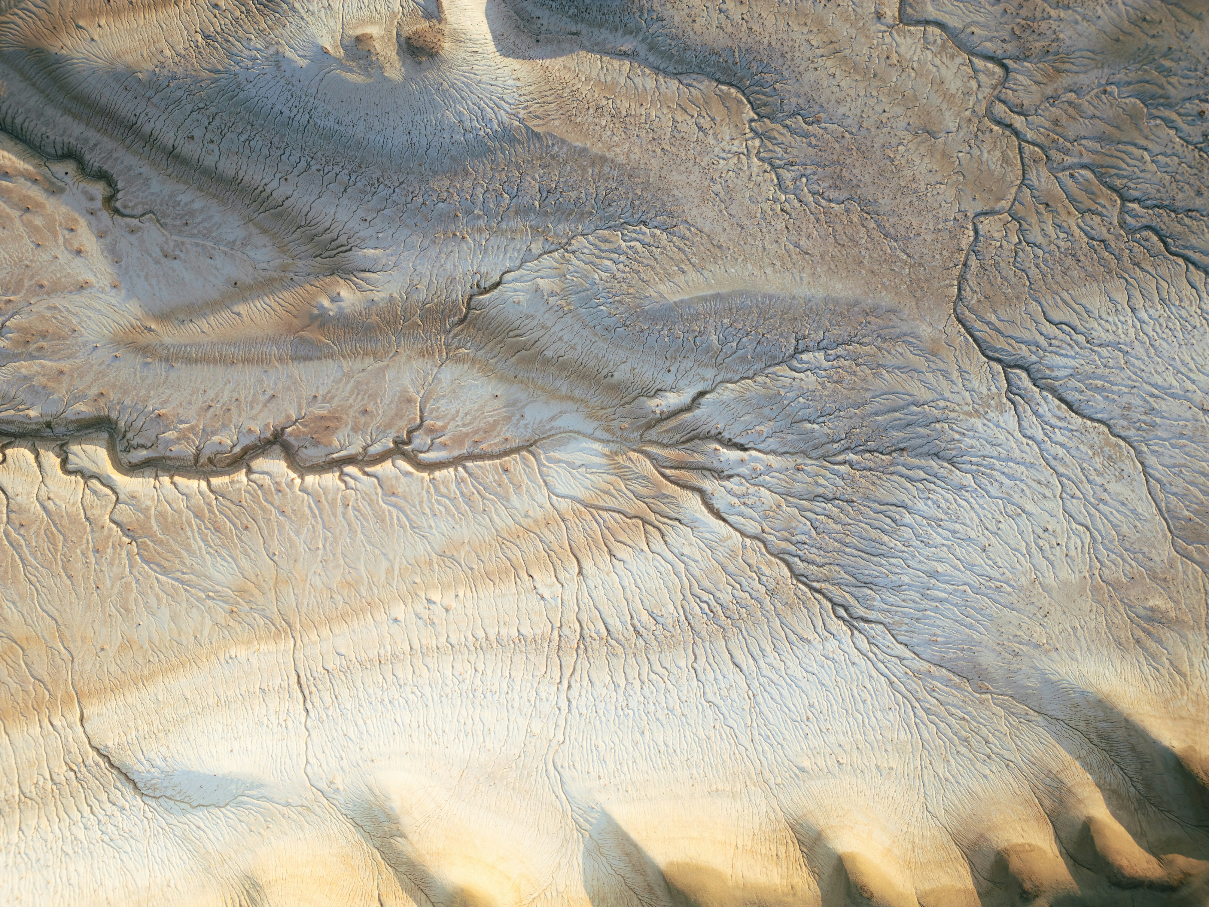 Abstract Aerial View Of Dry, Cracked Desert Land Formations. HD mobile wallpaper