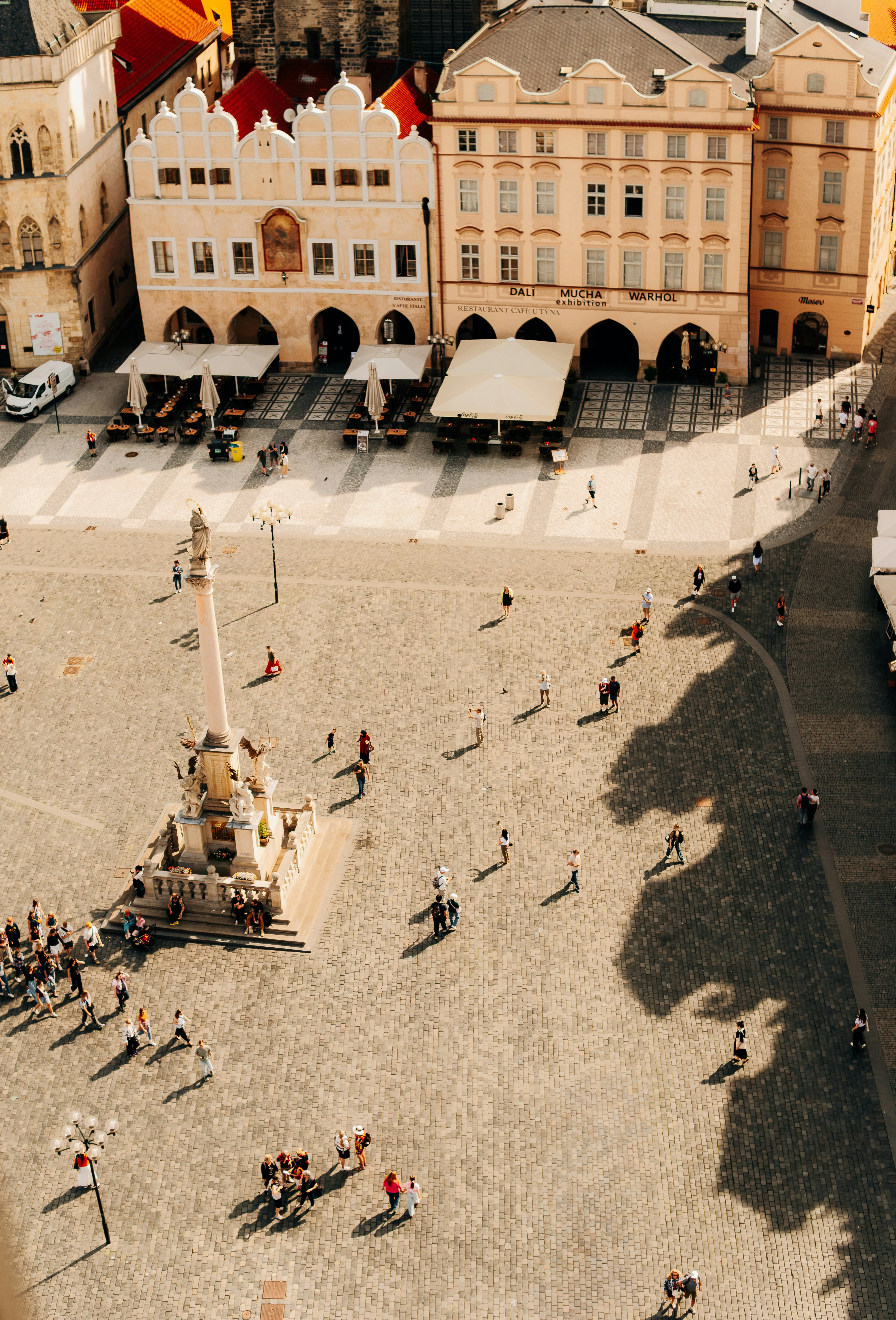 Sunlit Historic City Square With People And Ornate Buildings. HD mobile wallpaper