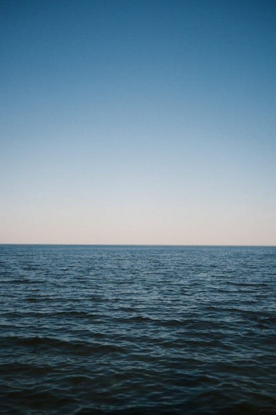 Blue Ocean Meets Clear Sky At Horizon wallpaper preview