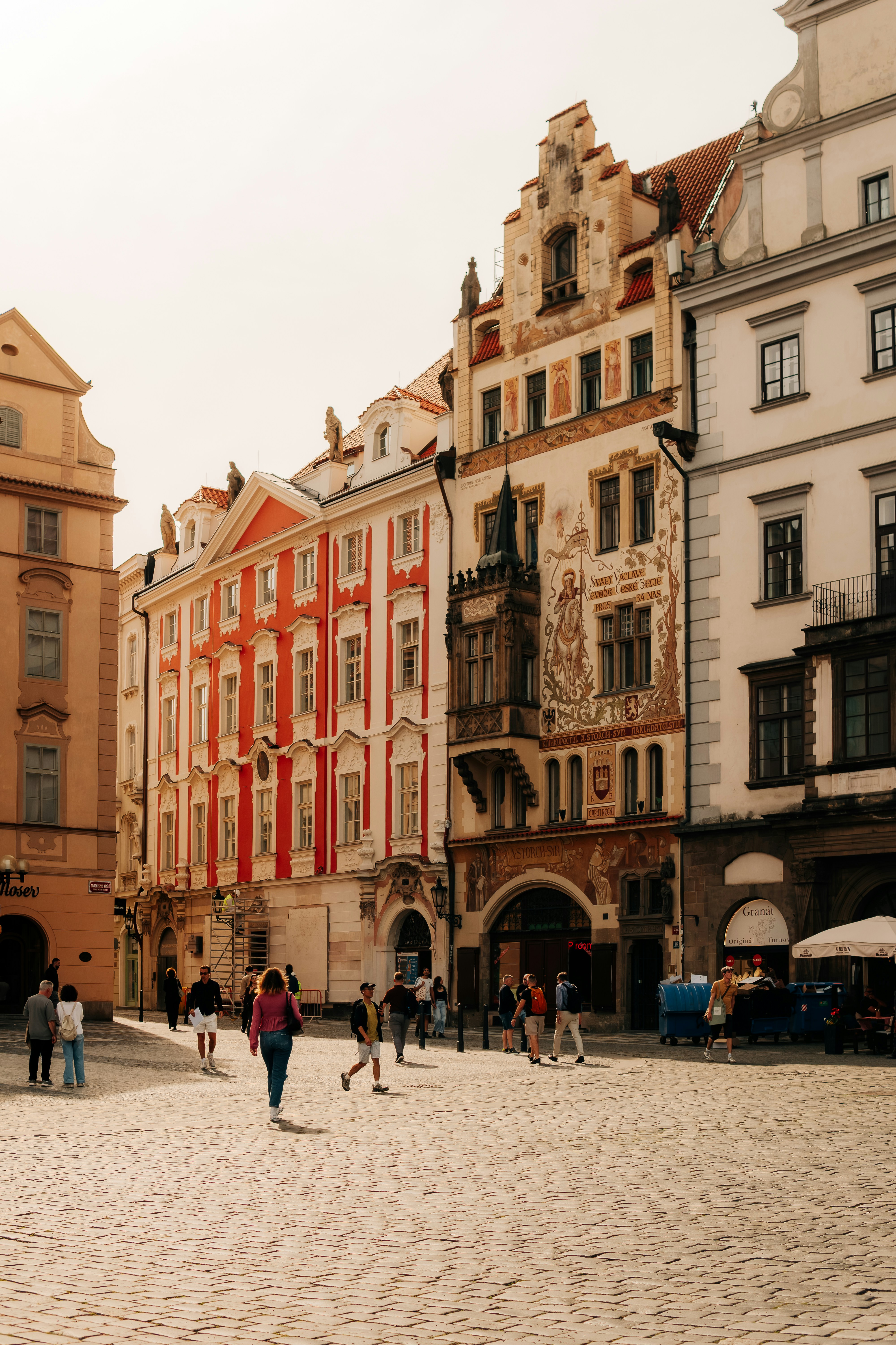 Historic European Buildings And People In A Bustling Cobblestone Square. HD mobile wallpaper