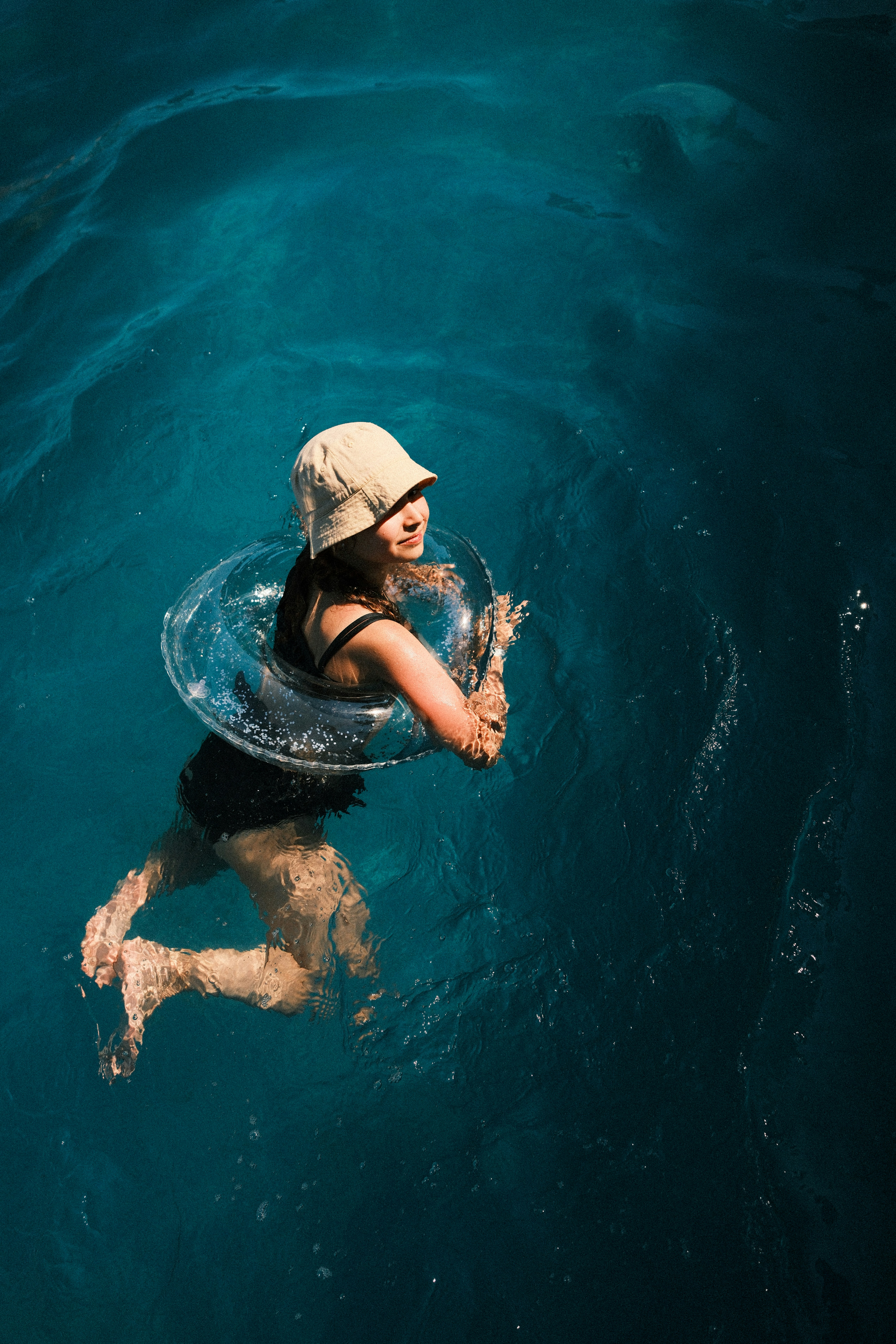 Woman In Hat Swimming With Clear Inflatable Ring HD mobile wallpaper
