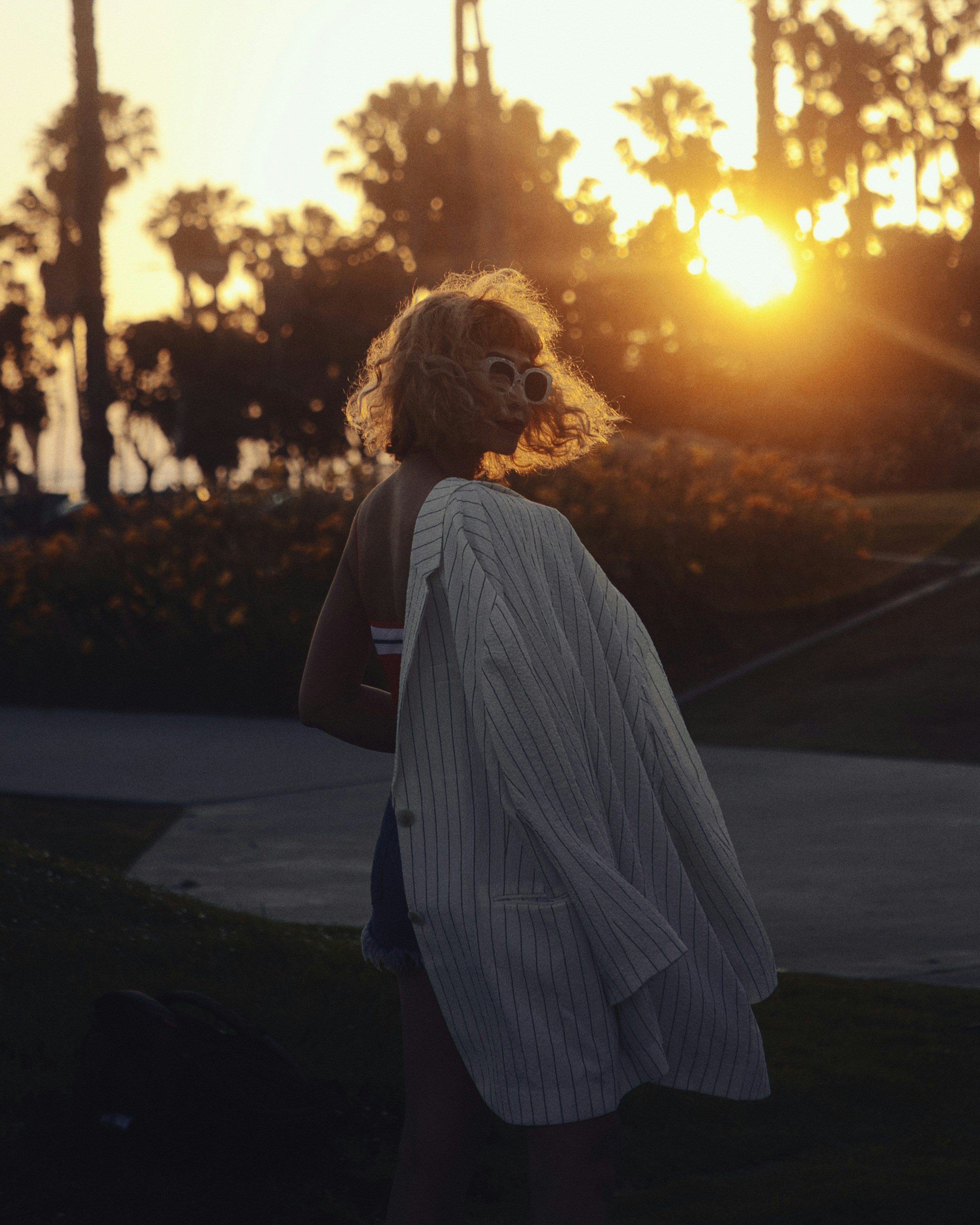 Woman In Silhouette Holding Jacket During Sunset HD mobile wallpaper