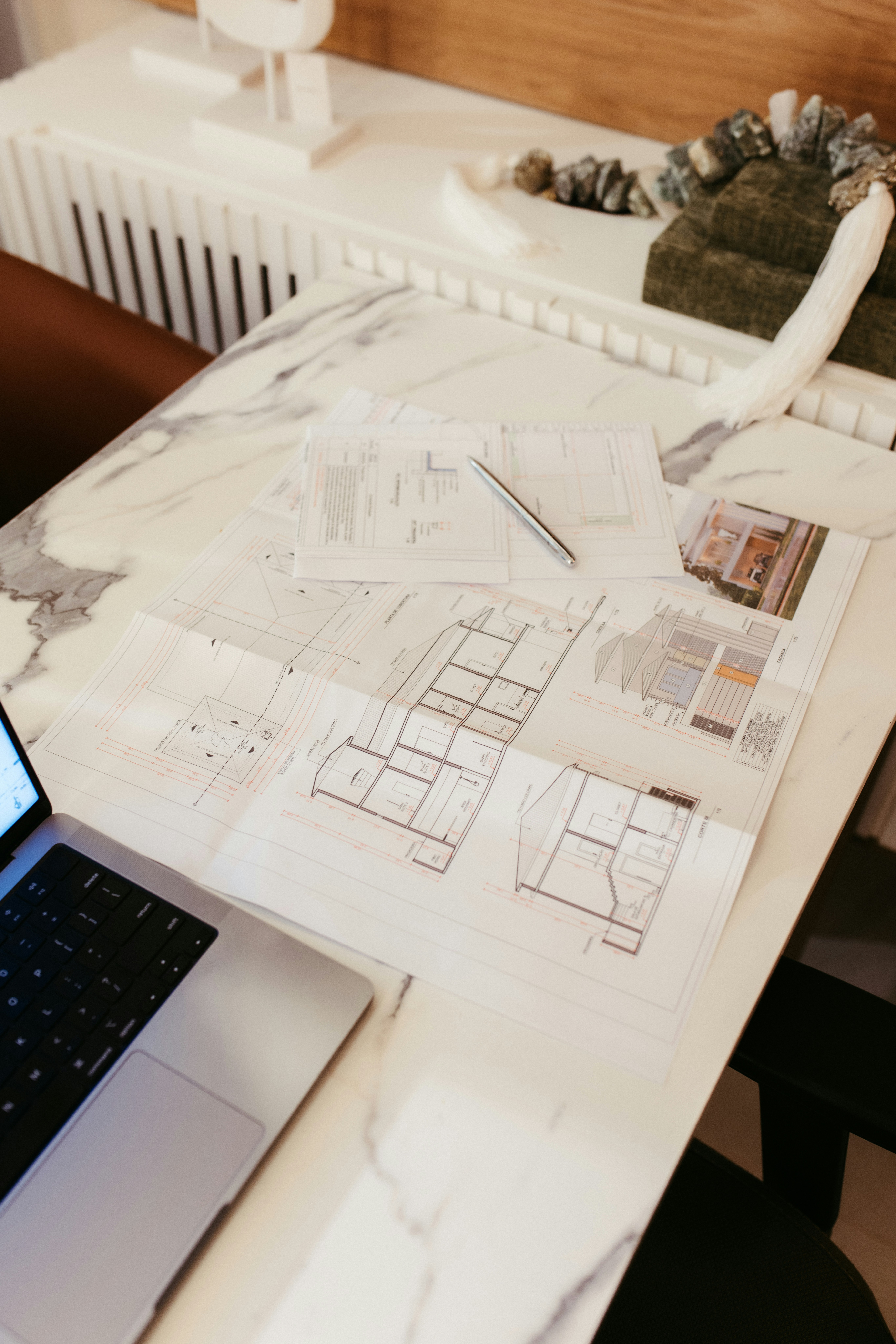 Architectural Blueprints And A Laptop On A Marble Desk. HD mobile wallpaper