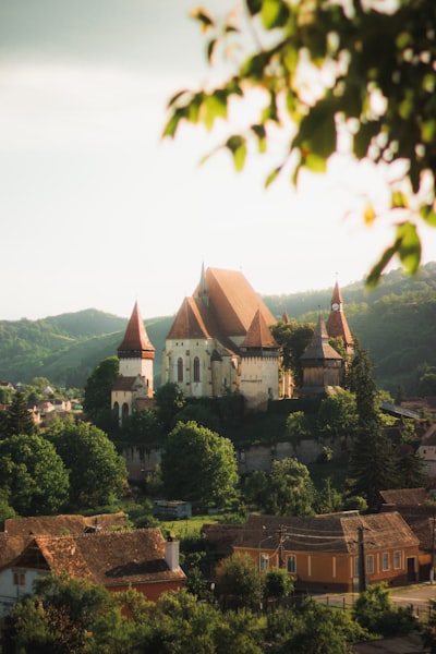 The Fortified Church Of Biertan On A Hill Above A Village In Romania wallpaper preview