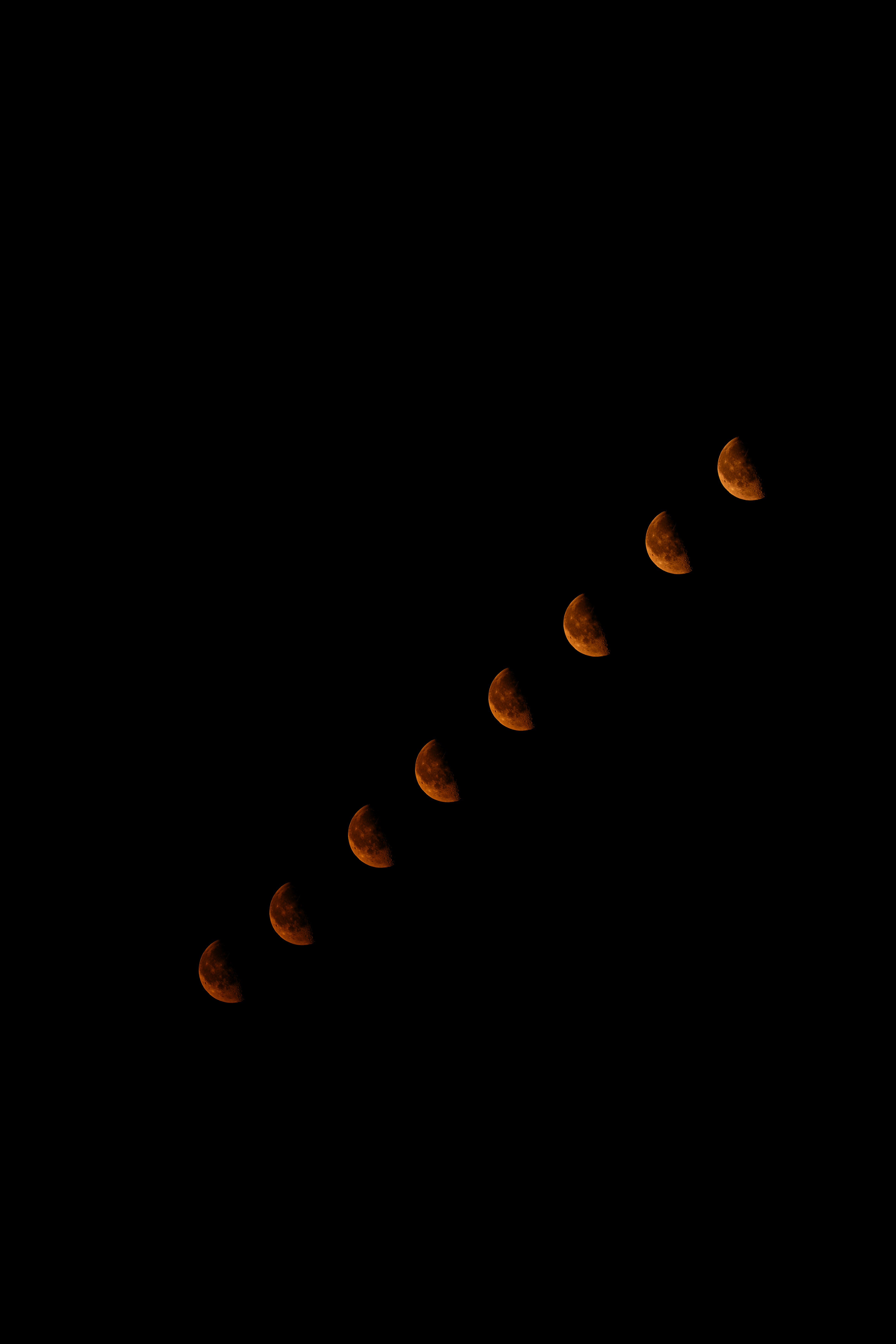 Lunar Eclipse Phases Diagonally Across A Dark Night Sky. HD mobile wallpaper