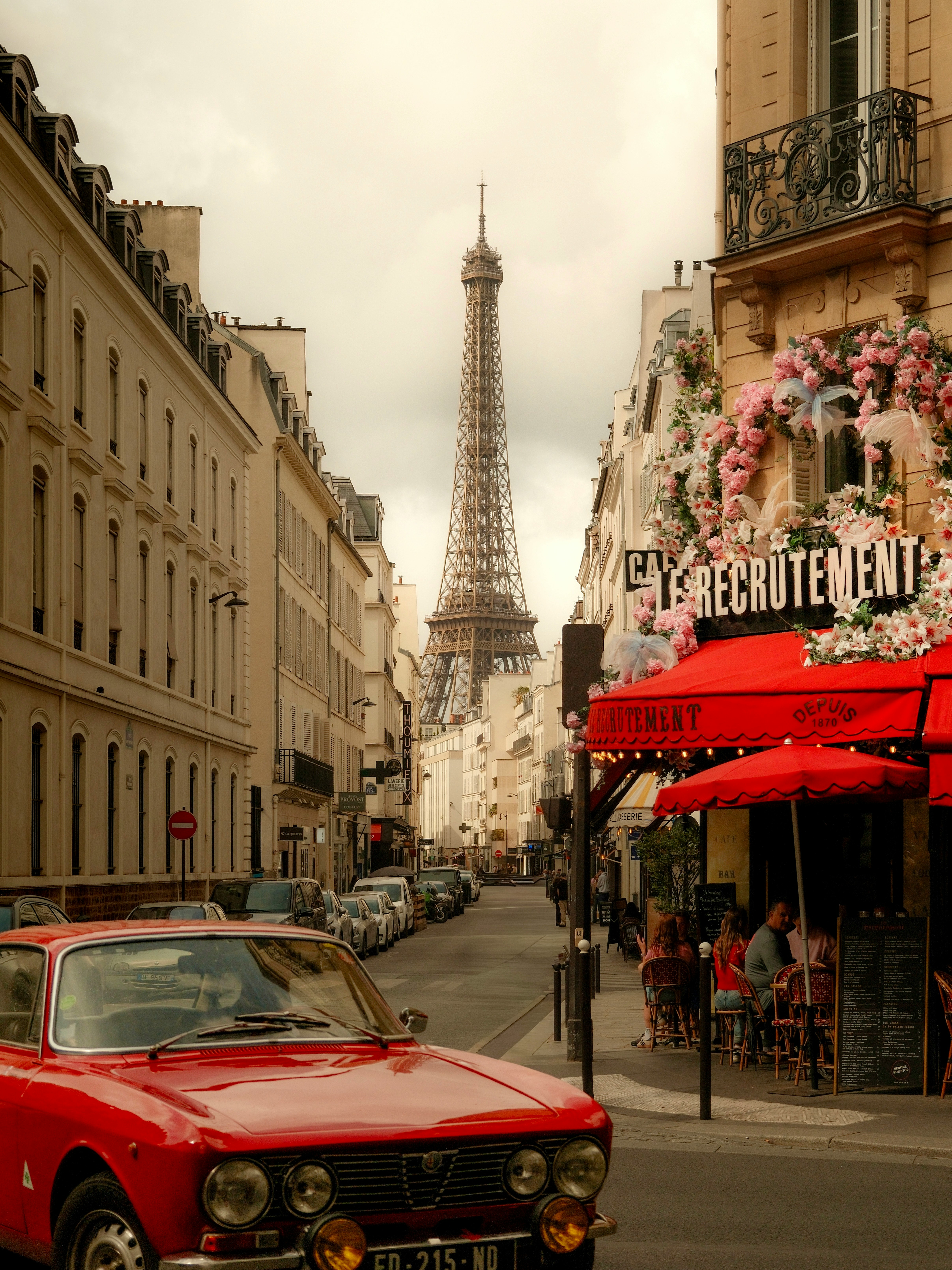 A Red Vintage Car On A Street In Paris With The Eiffel Tower Visible HD mobile wallpaper