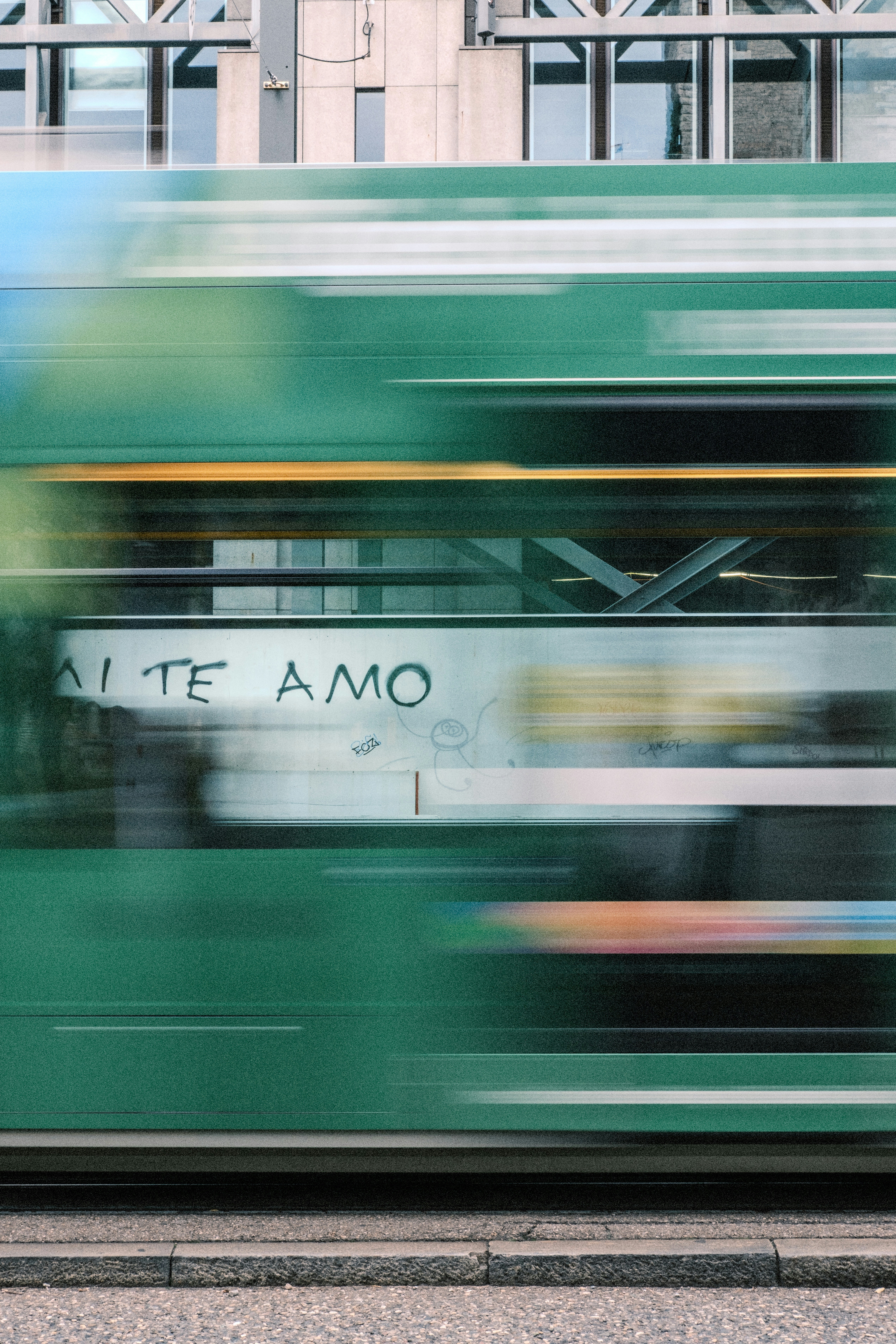 Green Tram With "te Amo" Graffiti In Motion HD mobile wallpaper