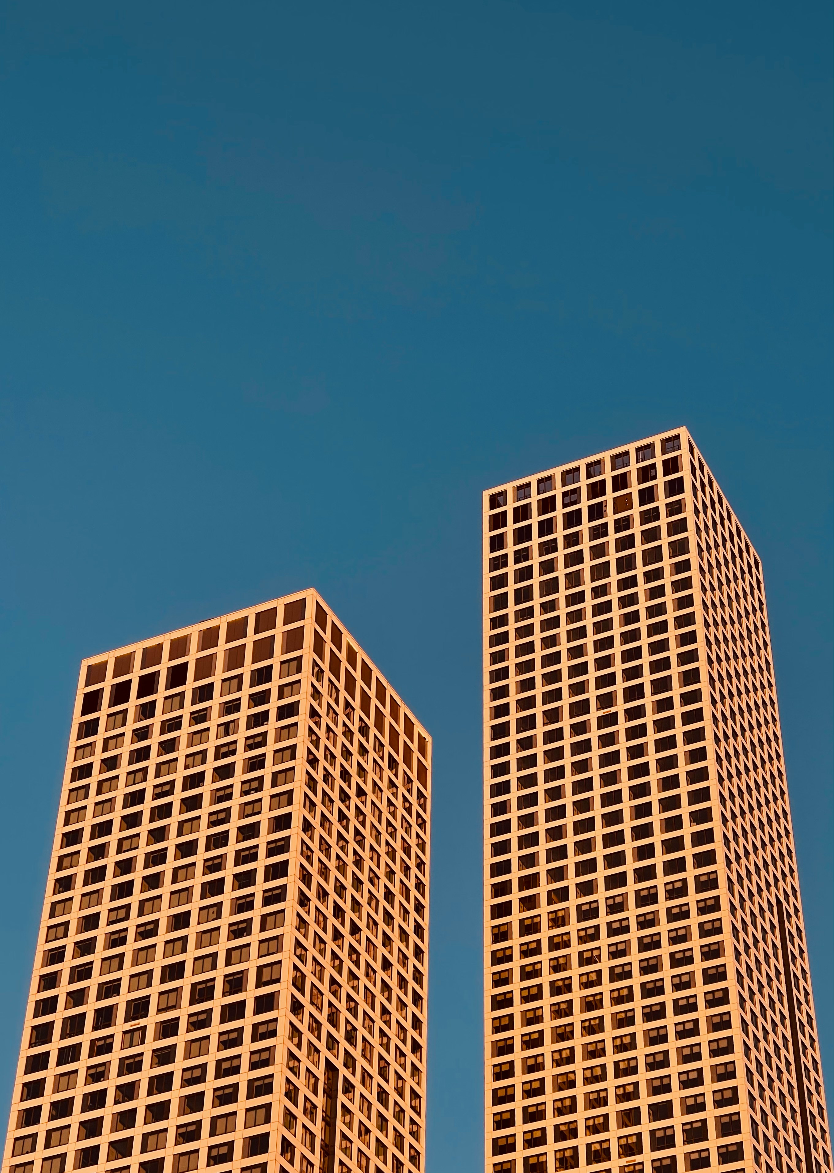Brown Concrete Building Under Blue Sky During Daytime HD mobile wallpaper