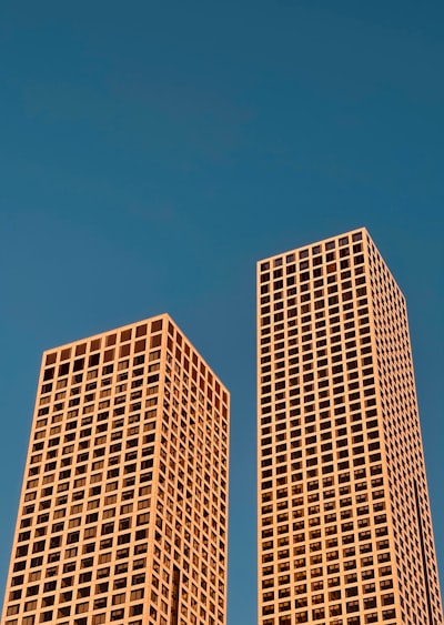 Brown Concrete Building Under Blue Sky During Daytime wallpaper preview