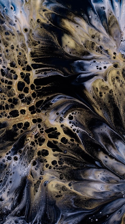 A Close Up Of A Black And Gold Abstract Painting wallpaper preview