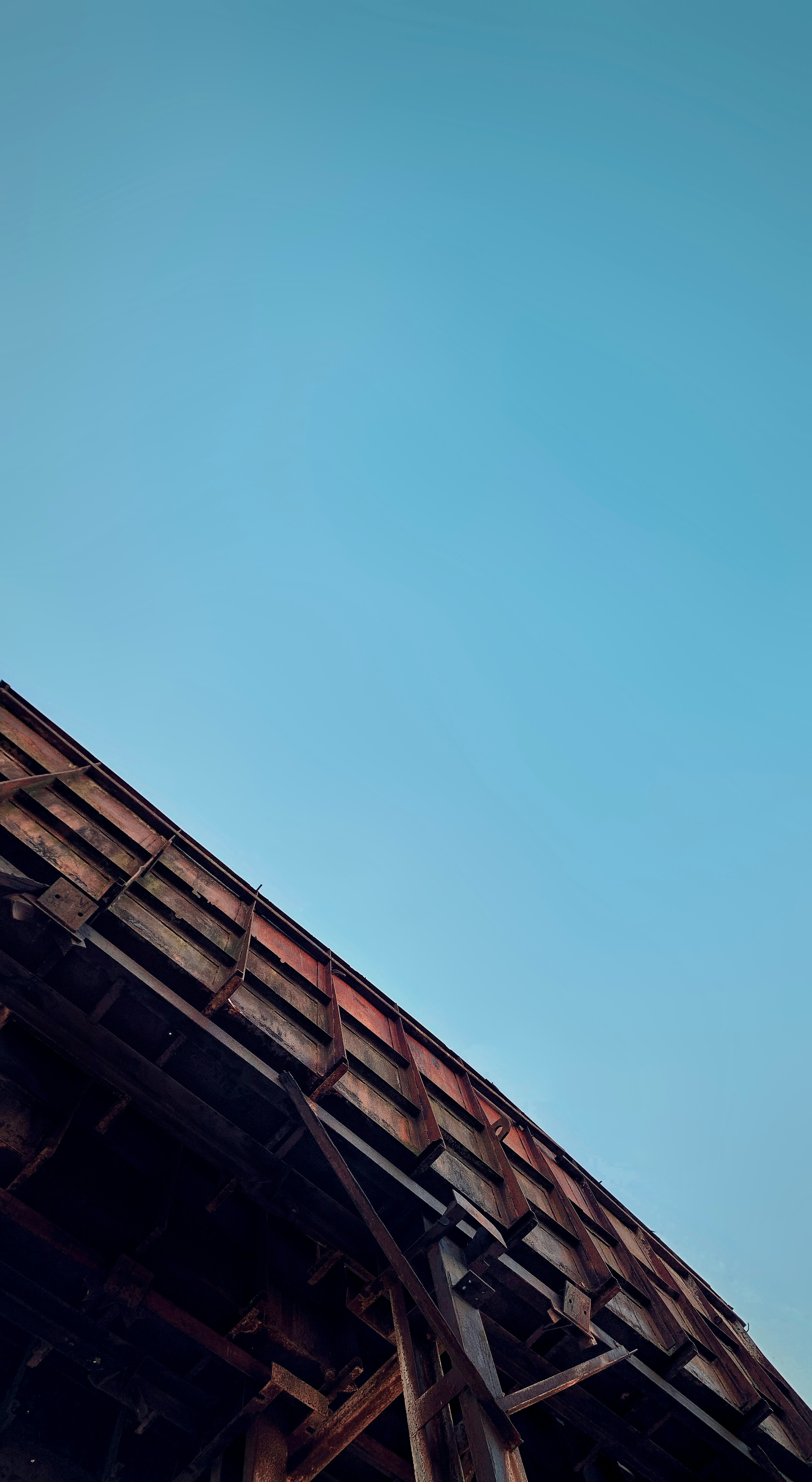 A Tall Clock Tower Towering Over A City HD mobile wallpaper