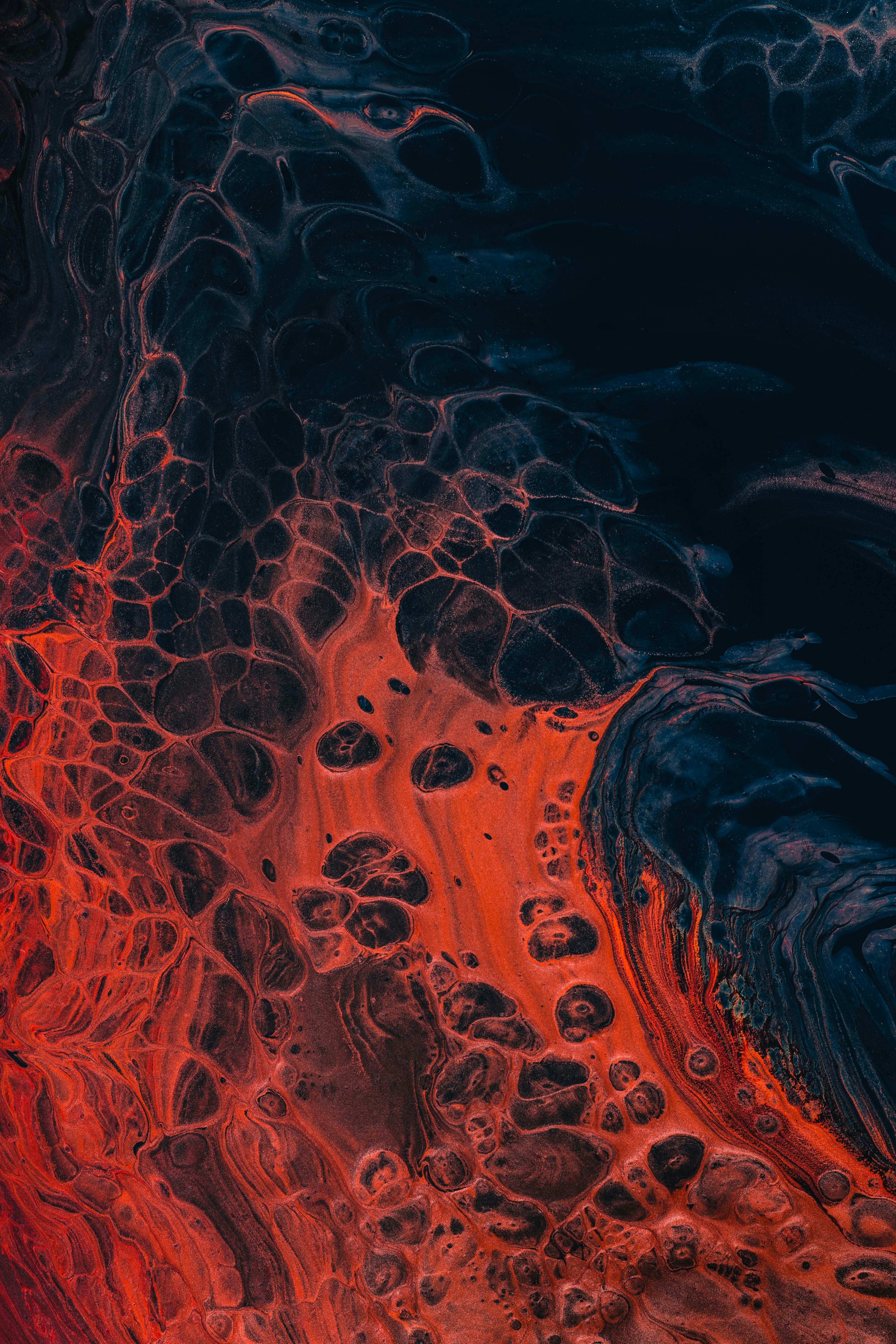 A Close Up Of A Red And Black Substance HD mobile wallpaper