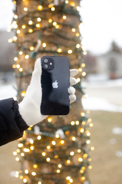 Holding An IPhone. wallpaper preview