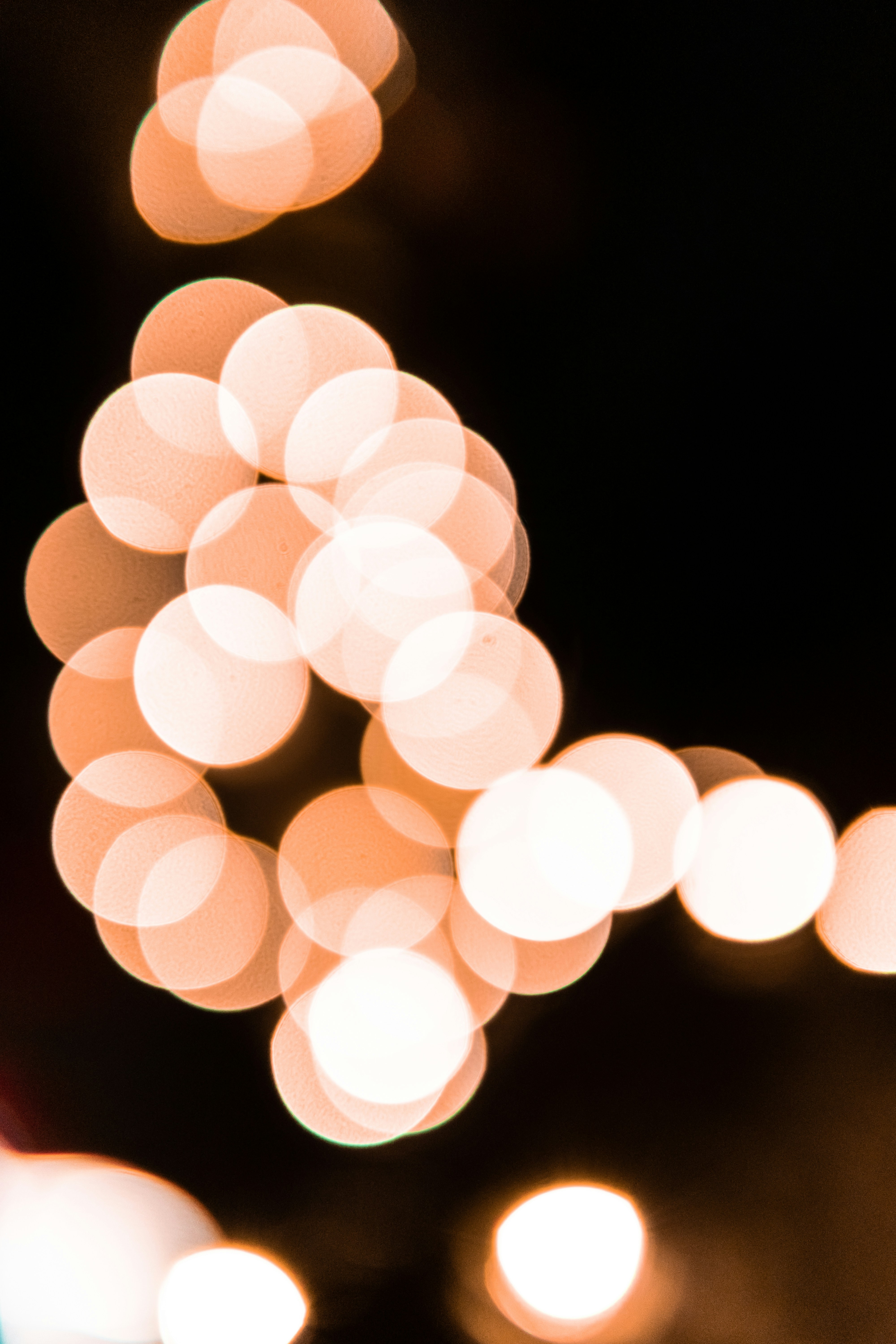 A Blurry Photo Of A Street Light At Night HD mobile wallpaper