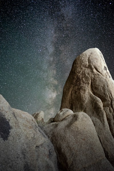 Brown Rock Formations Under Starry Night wallpaper preview